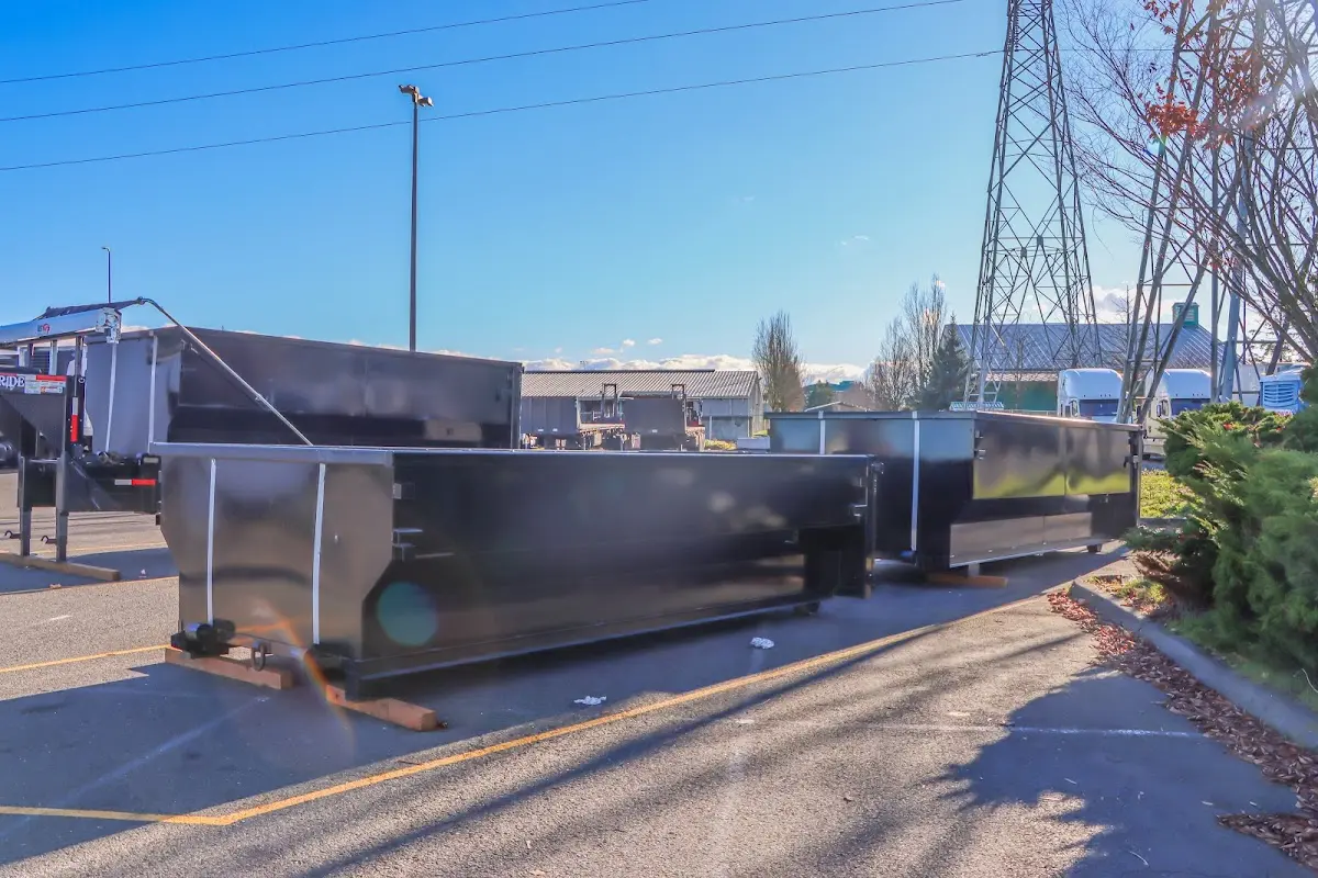 Roll-off dumpster ready for waste disposal at job site for Concrete Dumpster Rental in Belle Chasse